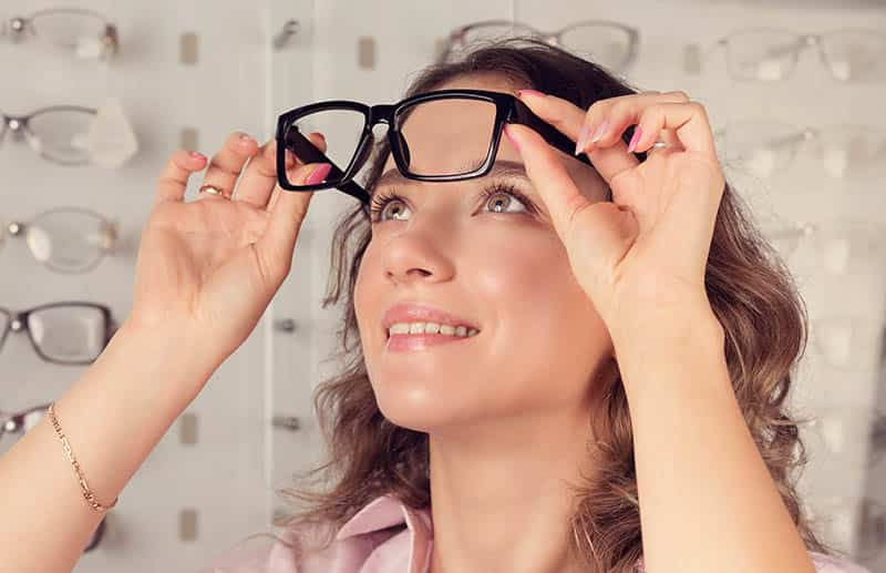 lady looking up at a glass